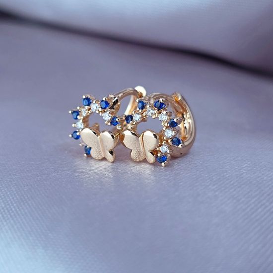 Imagen de Huggie Mariposa en un Mundo Azul