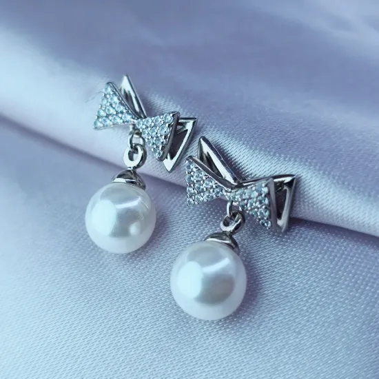 Imagen de Broquel Moño y Esfera de Perla