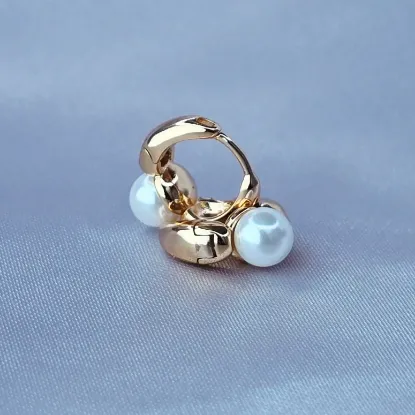 Imagen de Huggie Tomando Una Perla