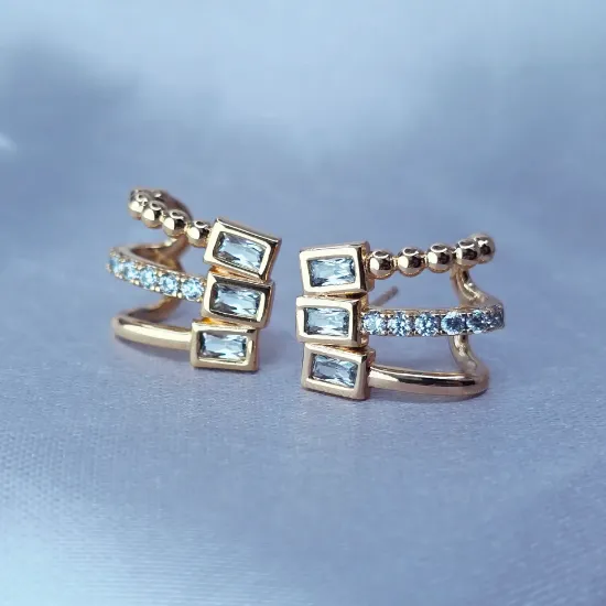 Imagen de Arete Tres Historias con Valor