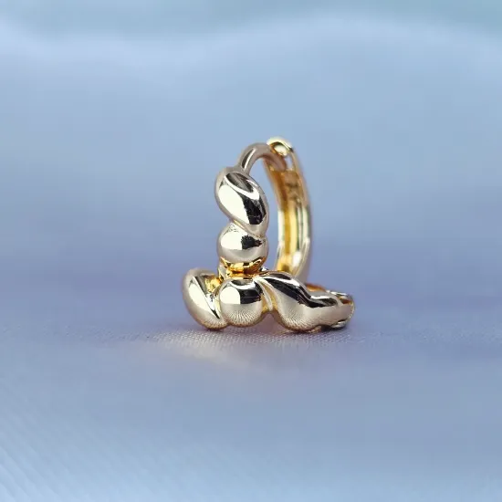 Imagen de Huggie Sosteniendo una Esfera